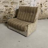 Vintage convertible armchair into a guest bed.