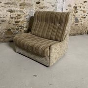Vintage convertible armchair into a guest bed
