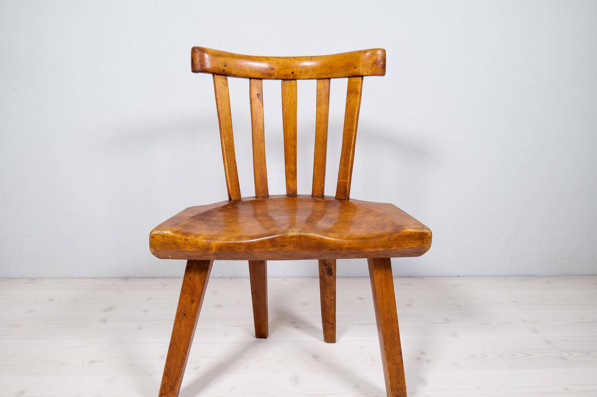 Swedish folk art chair from the 19th century with highly decorative forms.