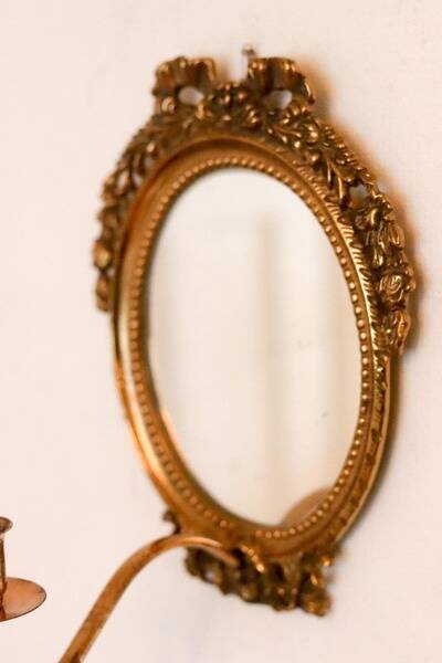 Pair of Swedish brass sconces with mirror