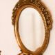 Pair of Swedish brass sconces with mirror