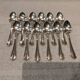 12 Christofle silver plated dessert spoons, 17cm