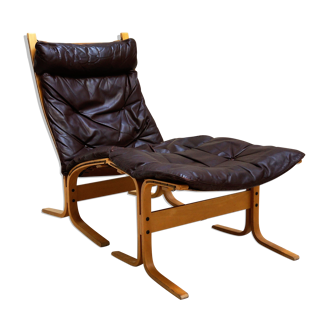 Siesta chair in brown leather and its Ottoman