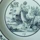 CHOISY HOLLOW PLATE IN FINE FAIENCE ON THE THEME OF THE MONTHS "APRIL"