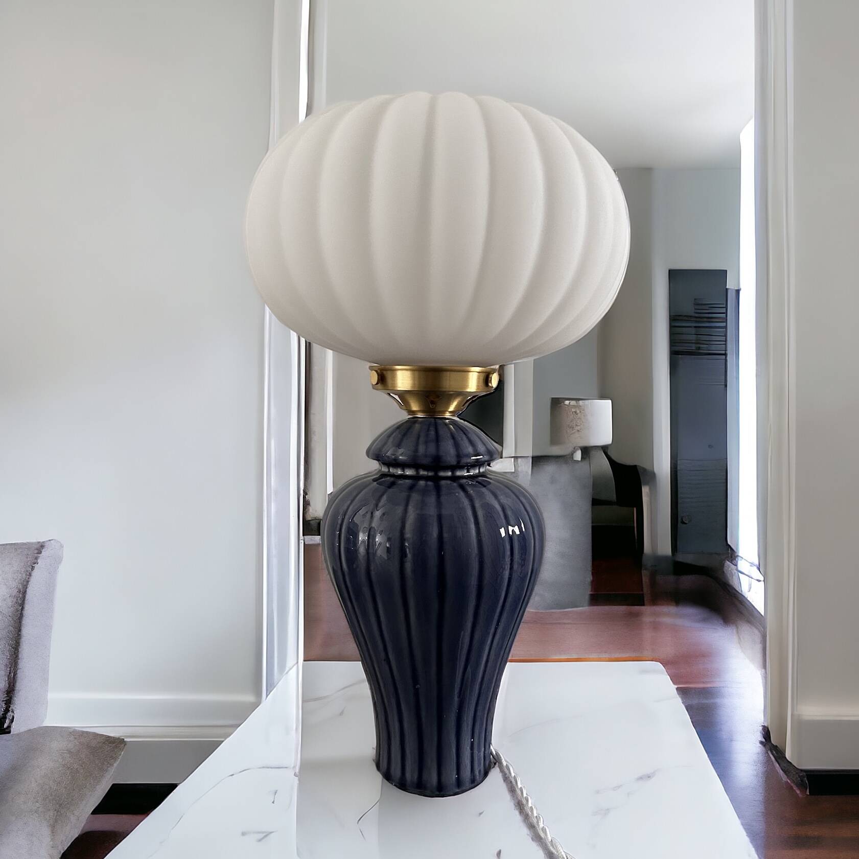 Geometric table lamp with pleated opaline shade