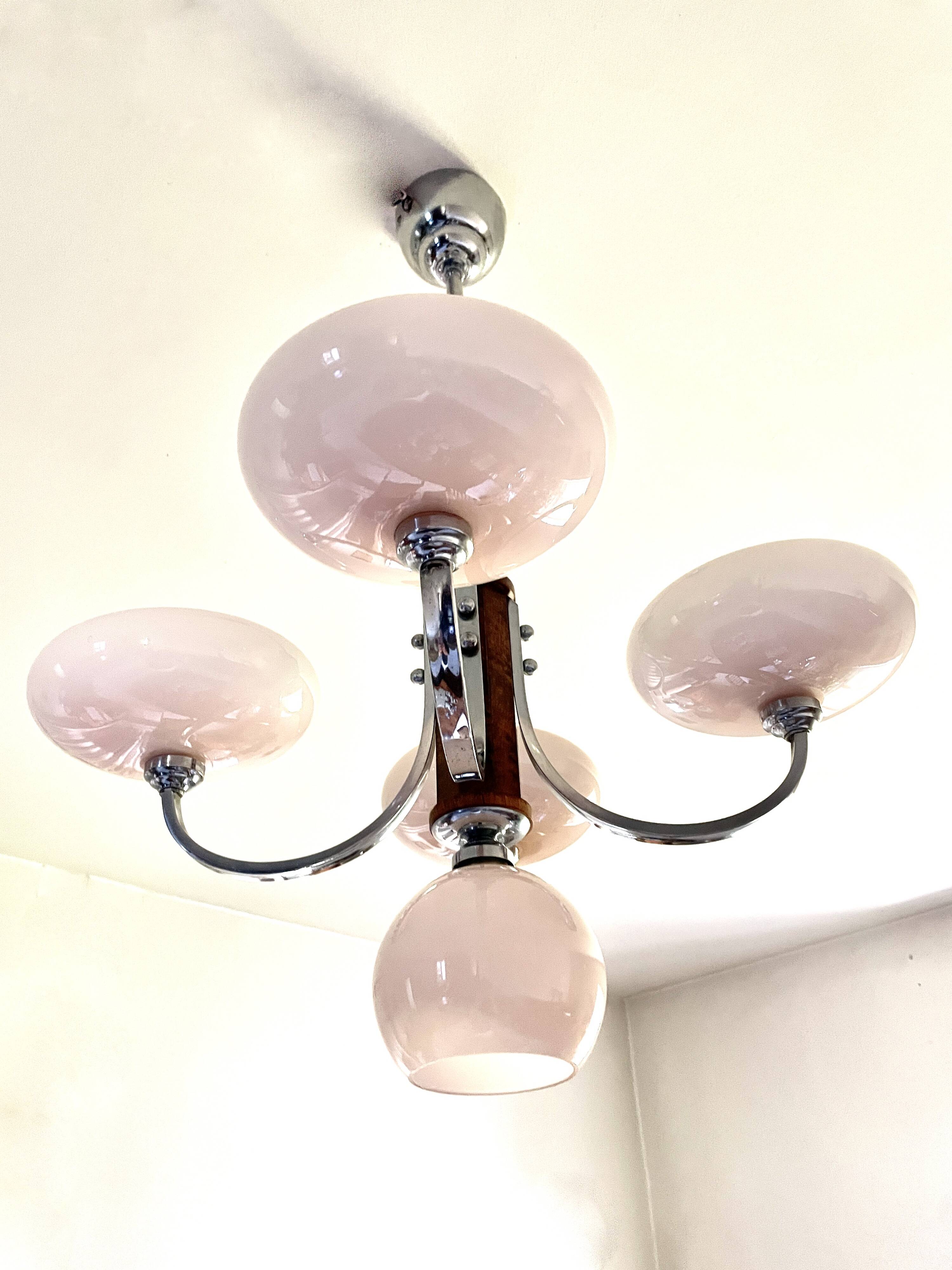 Art Deco lustre with pink glass, wood, and chrome from the 1930s.