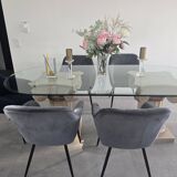 Oval glass table with marble column.
