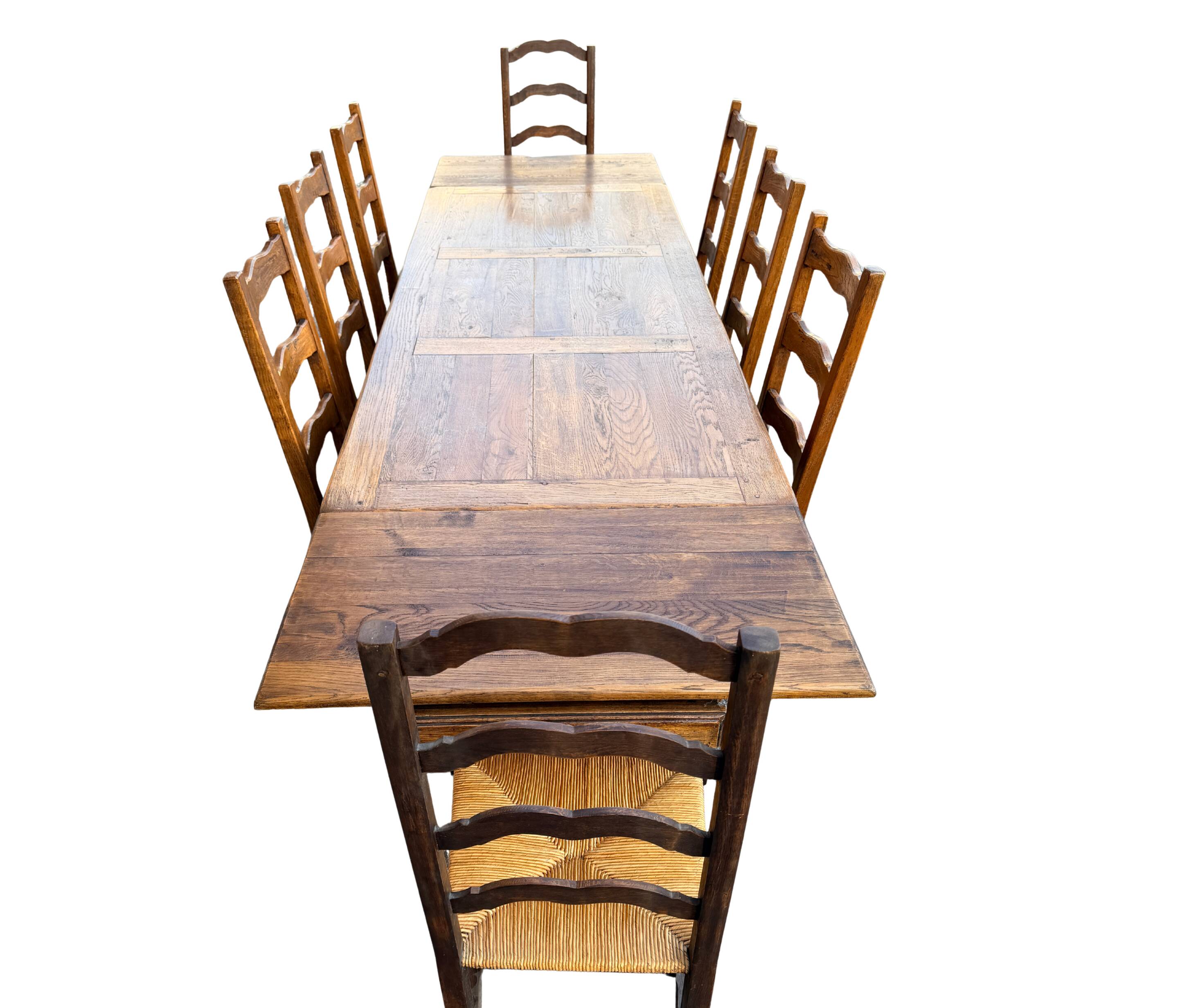 Large farmhouse table made of solid wood.