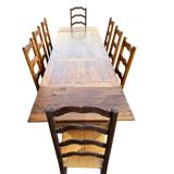 Large farmhouse table made of solid wood.