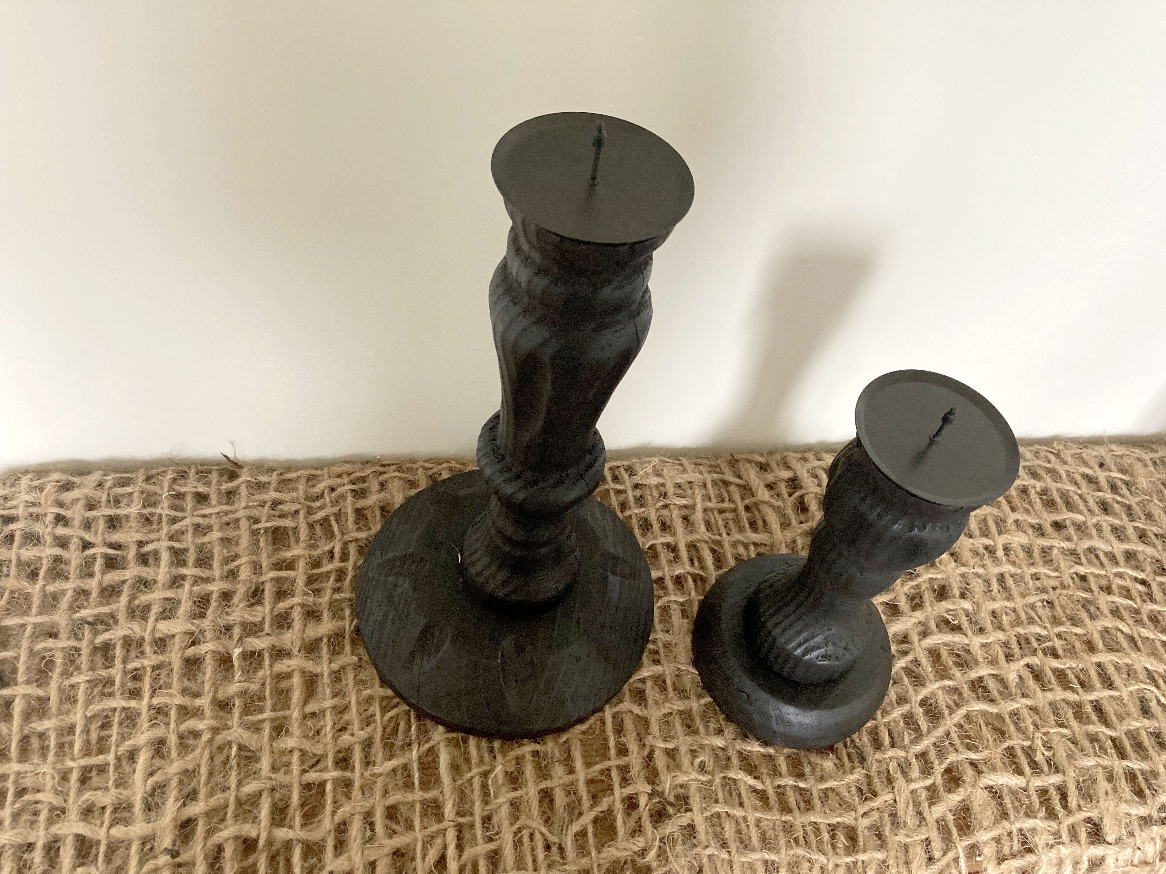 Black wooden candlesticks
