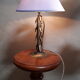 Iron-style lamp with bronze patina