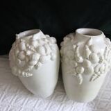 Pair of white vases with shells