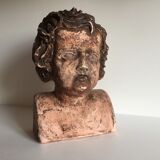 Bust old child in plaster stamped l.j.c.