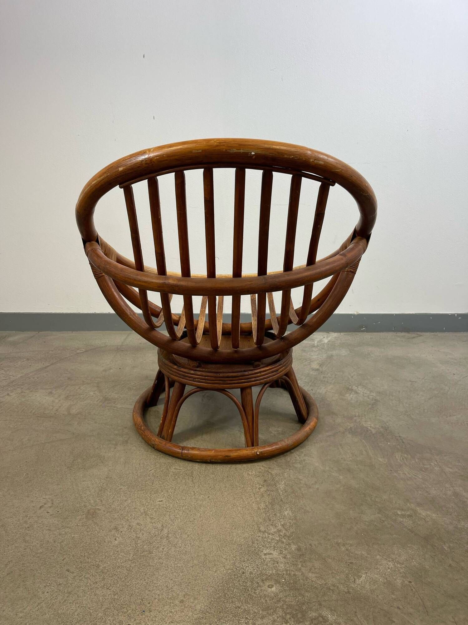 Vintage rattan swivel saucer armchair from the 70s