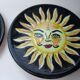 2 hand-decorated ceramic plates