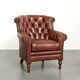 Cognac-coloured cow leather Chesterfield armchair in English style