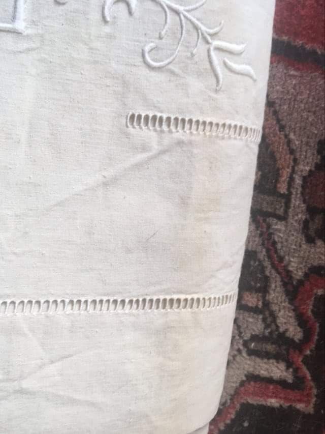 Mixed-race sheet with JPG monogram.