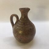 Pitcher in pyrite sandstone