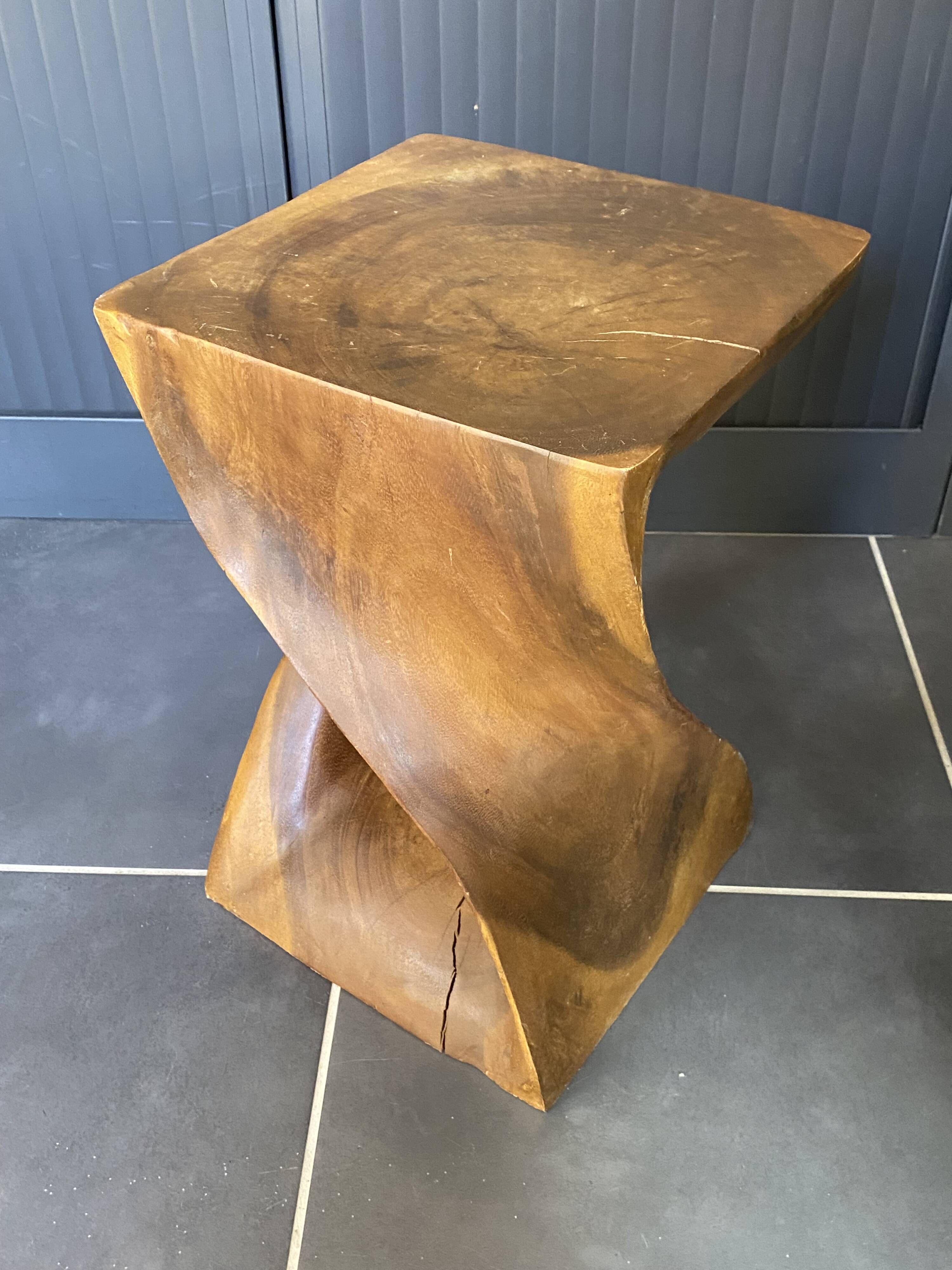 Stool no. 1 in solid raw walnut wood, carved from the mass, 1970.