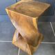 Stool no. 1 in solid raw walnut wood, carved from the mass, 1970.