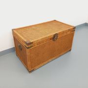 Vintage trunk in wood, rattan, caning, and brass.