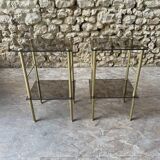 Pair of glass side tables with gilded feet