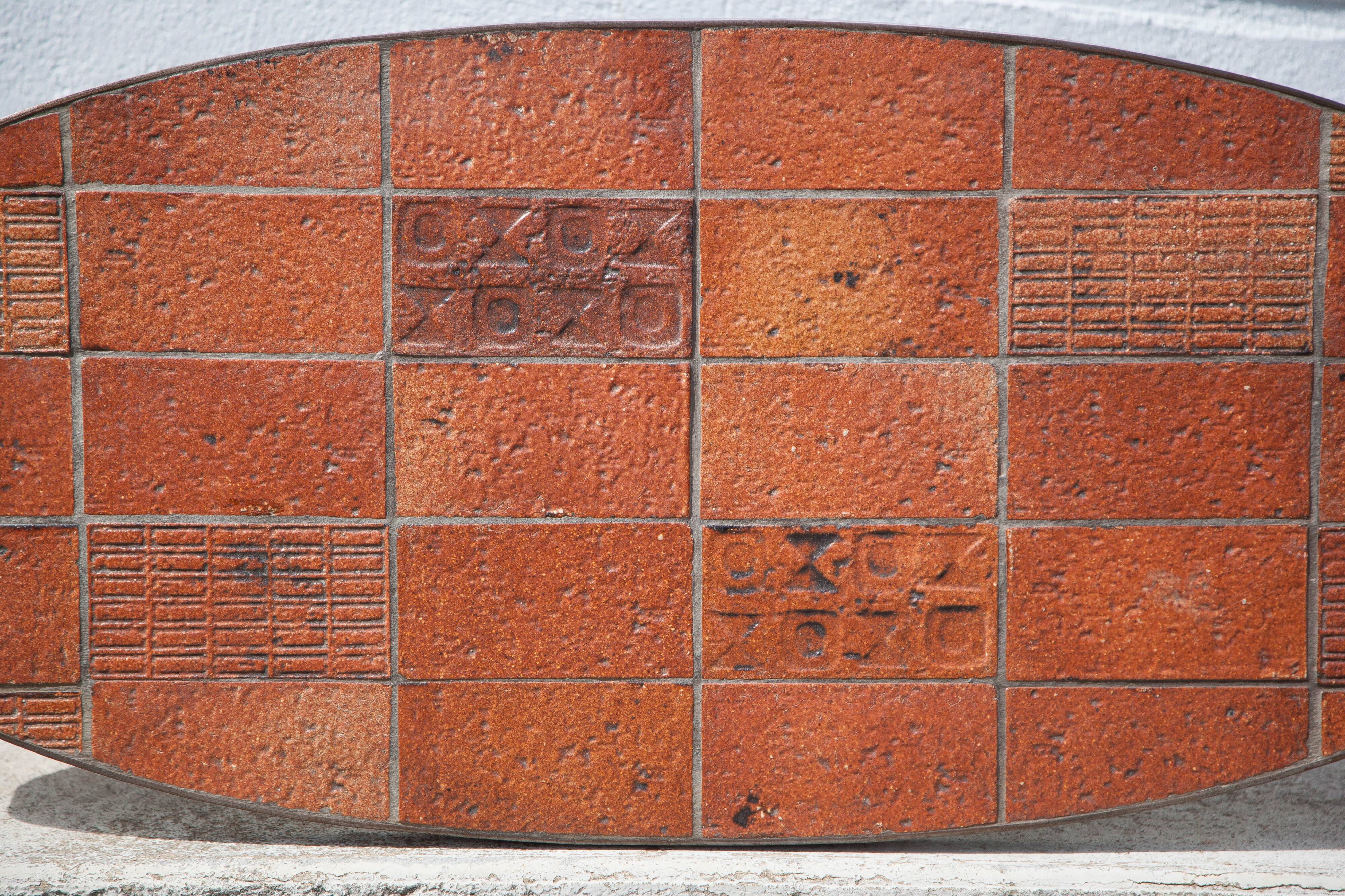 Jean Jaffeux coffee table, glazed lava stone table with wrought iron structure, 60's