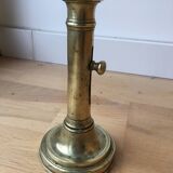 Brass candle holder with push button