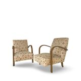 Ensemble de fauteuils Art Déco avec accoudoirs en hêtre arqués.