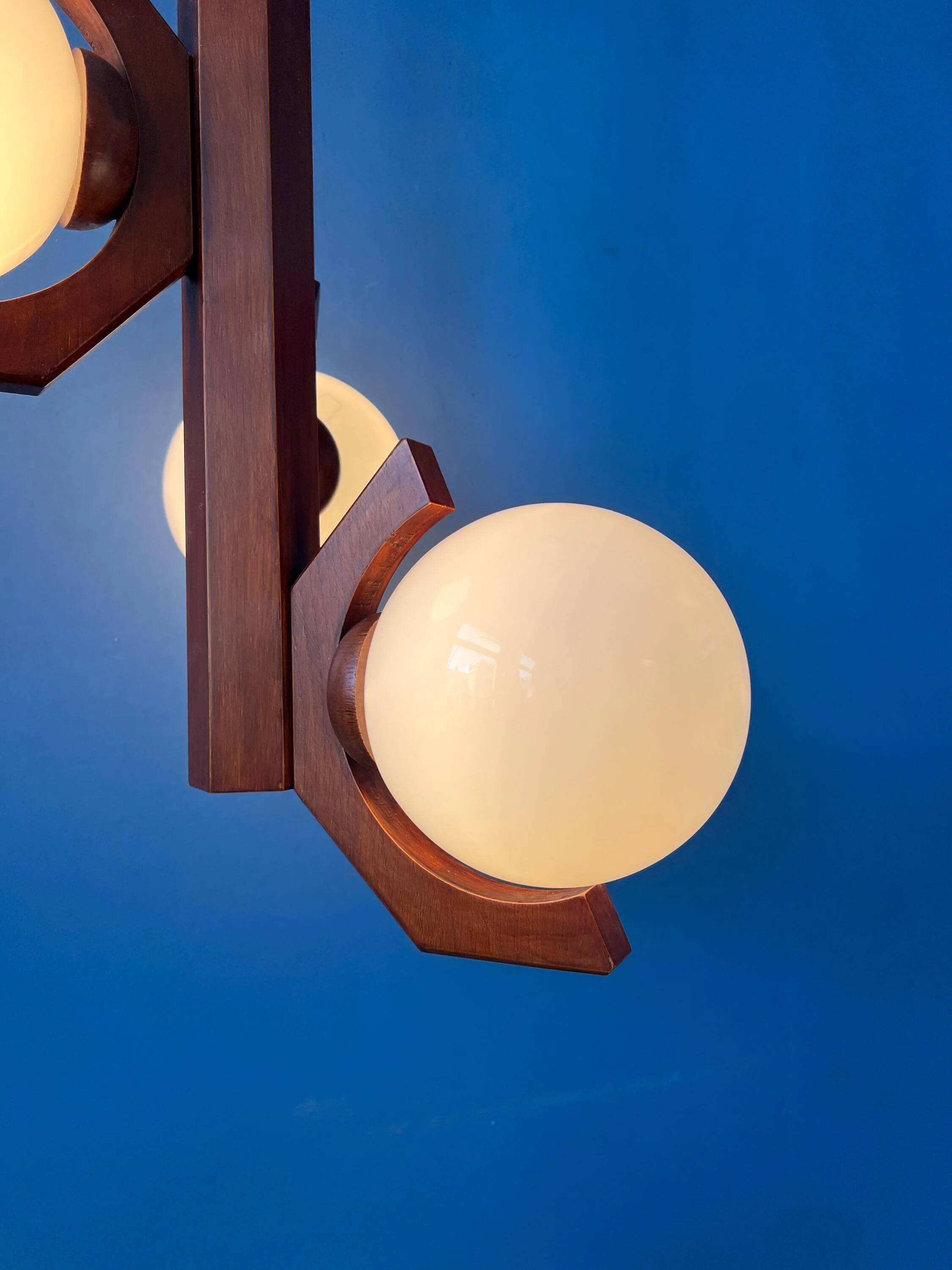 Mid-century brown Bony suspension with opaline glass shade.