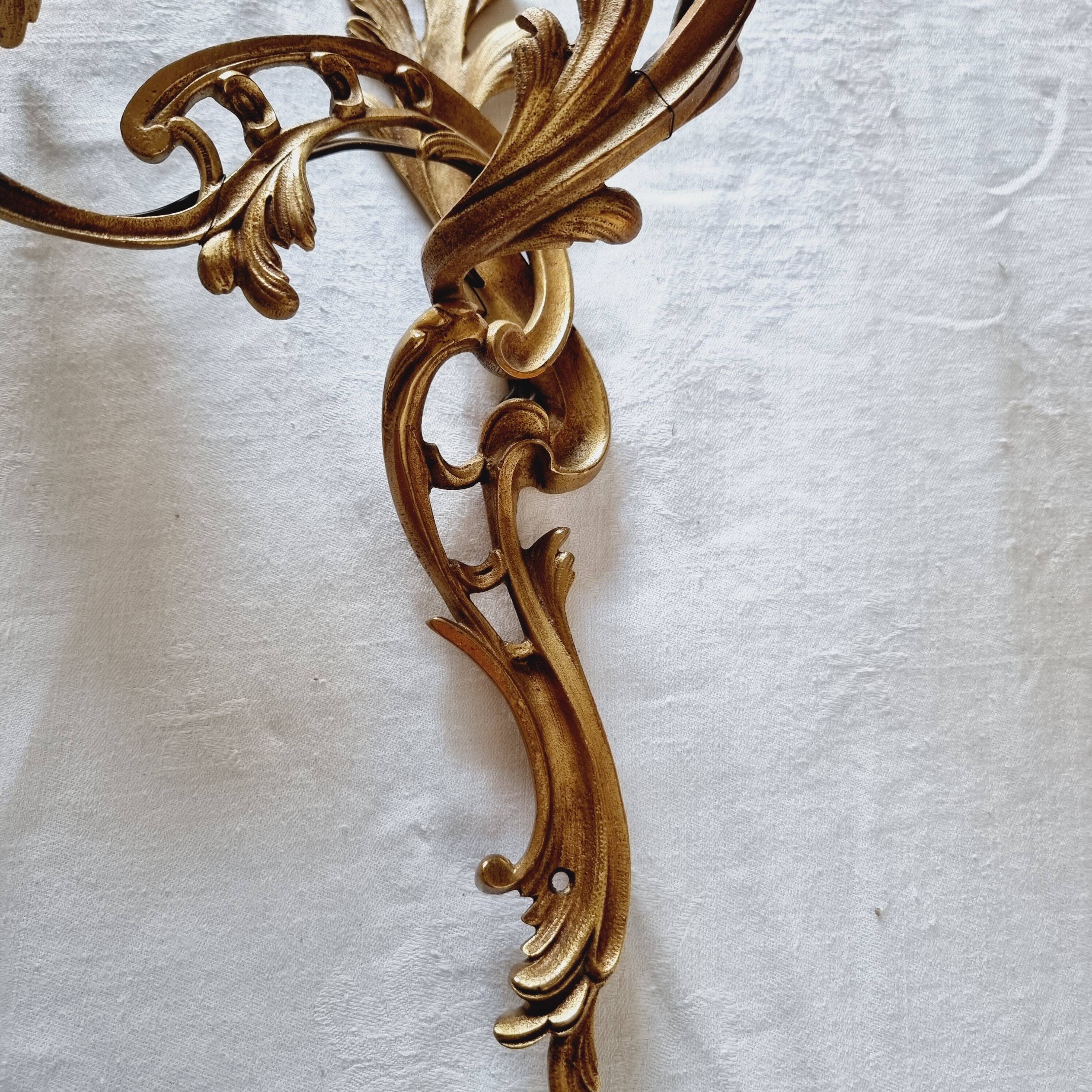 Pair of vintage French wall sconces in bronze, Louis XV Rococo style.