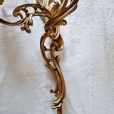 Pair of vintage French wall sconces in bronze, Louis XV Rococo style.