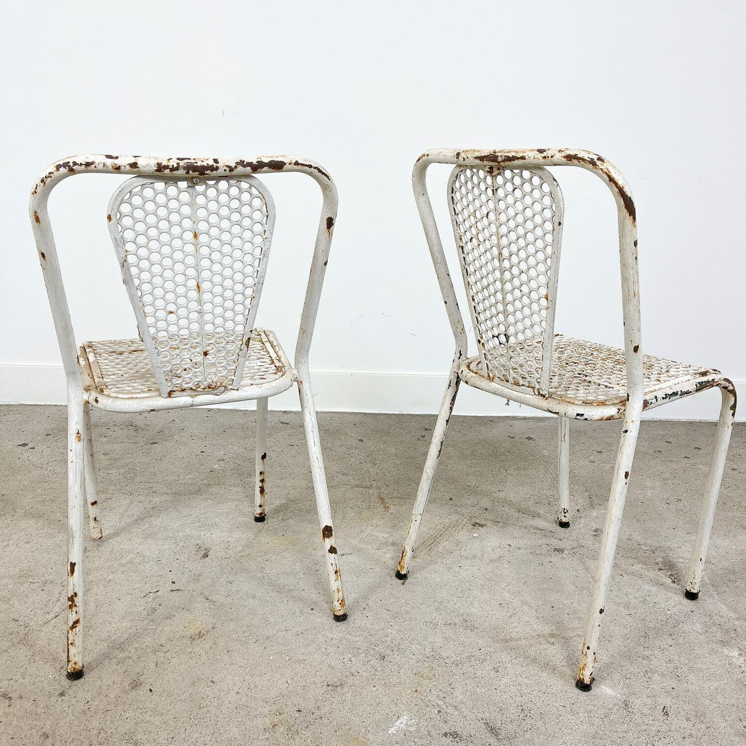 Set of three vintage industrial metal bistro chairs by Rene malaval