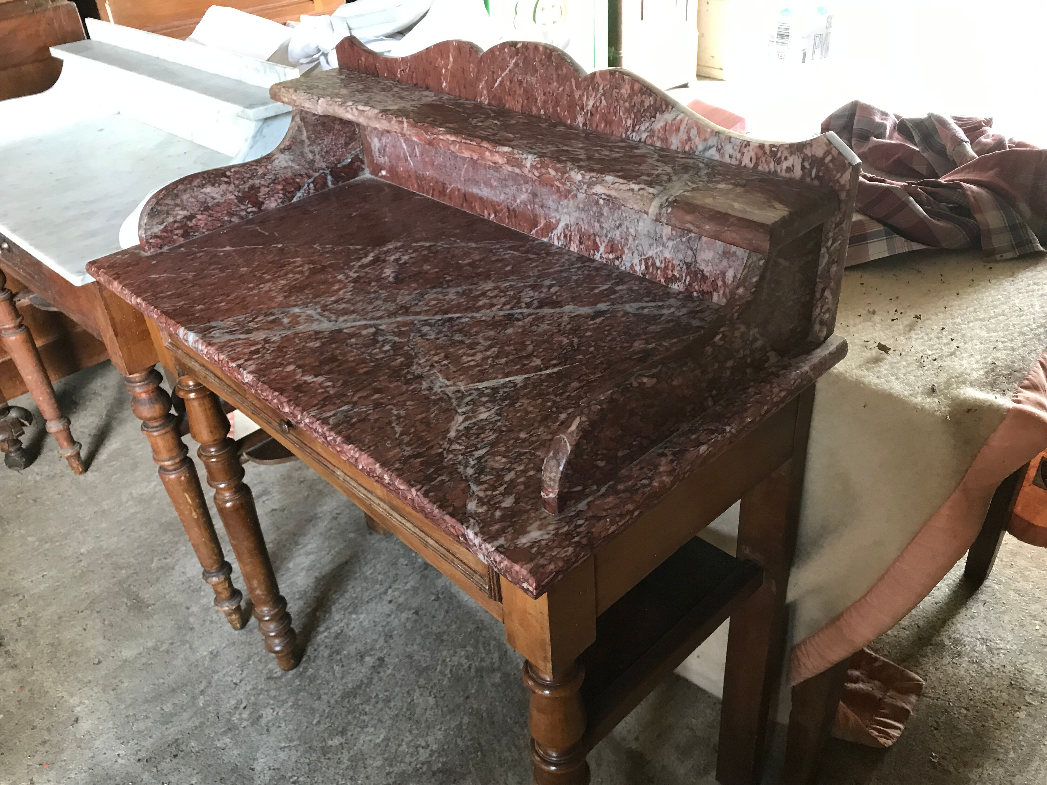 Toilet table on red marble