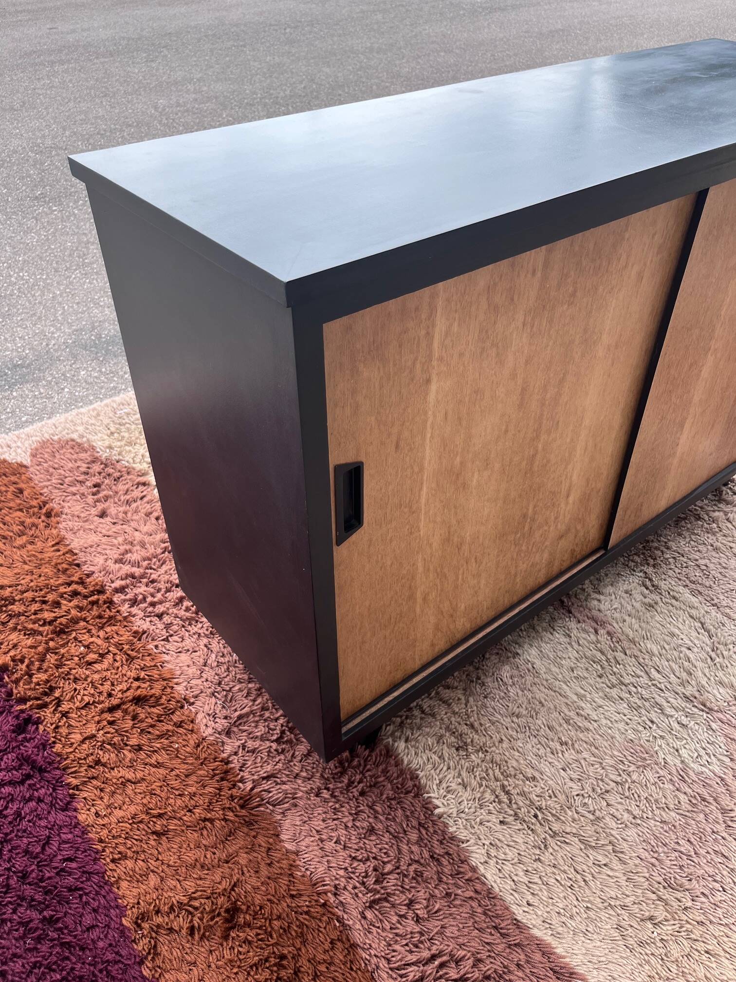 black and wood two-door sideboard