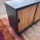 black and wood two-door sideboard