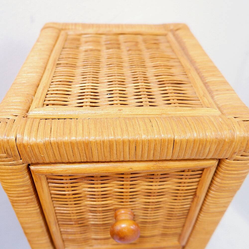 Pair of vintage wicker bedside tables with five drawers.