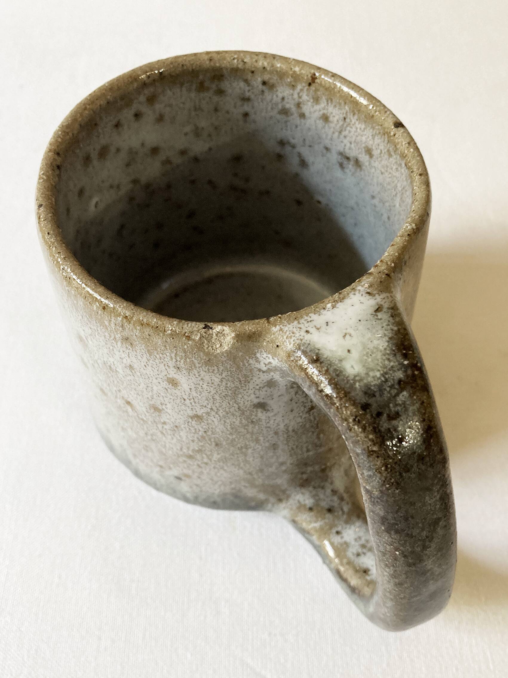 Trio of stoneware mugs