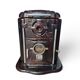 Vintage Godin Art Deco cast iron stove in aubergine enamel.