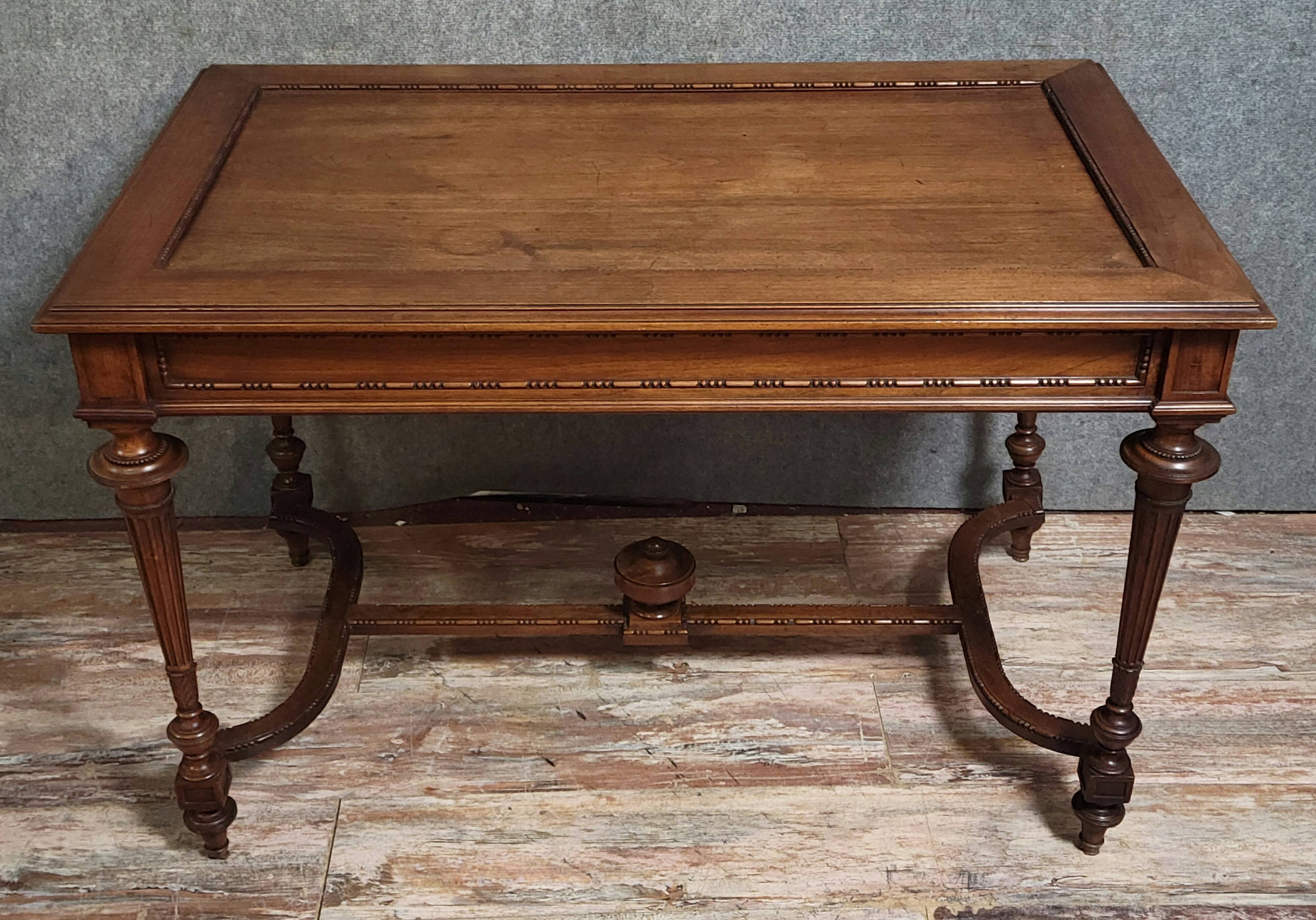 Louis XVI style desk with a curved top, in mahogany.
