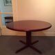 Round rosewood table with central leg, Scandinavian design møllers møbelfabrik