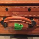 Thick leather suitcase