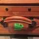 Thick leather suitcase
