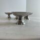 Set of 6 stainless steel dessert bowls on a stand.