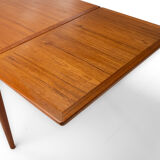 Extendable dining table in teak by Johannes Andersen for Uldum Møbelfabrik