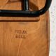Teak chair with writing tablet
