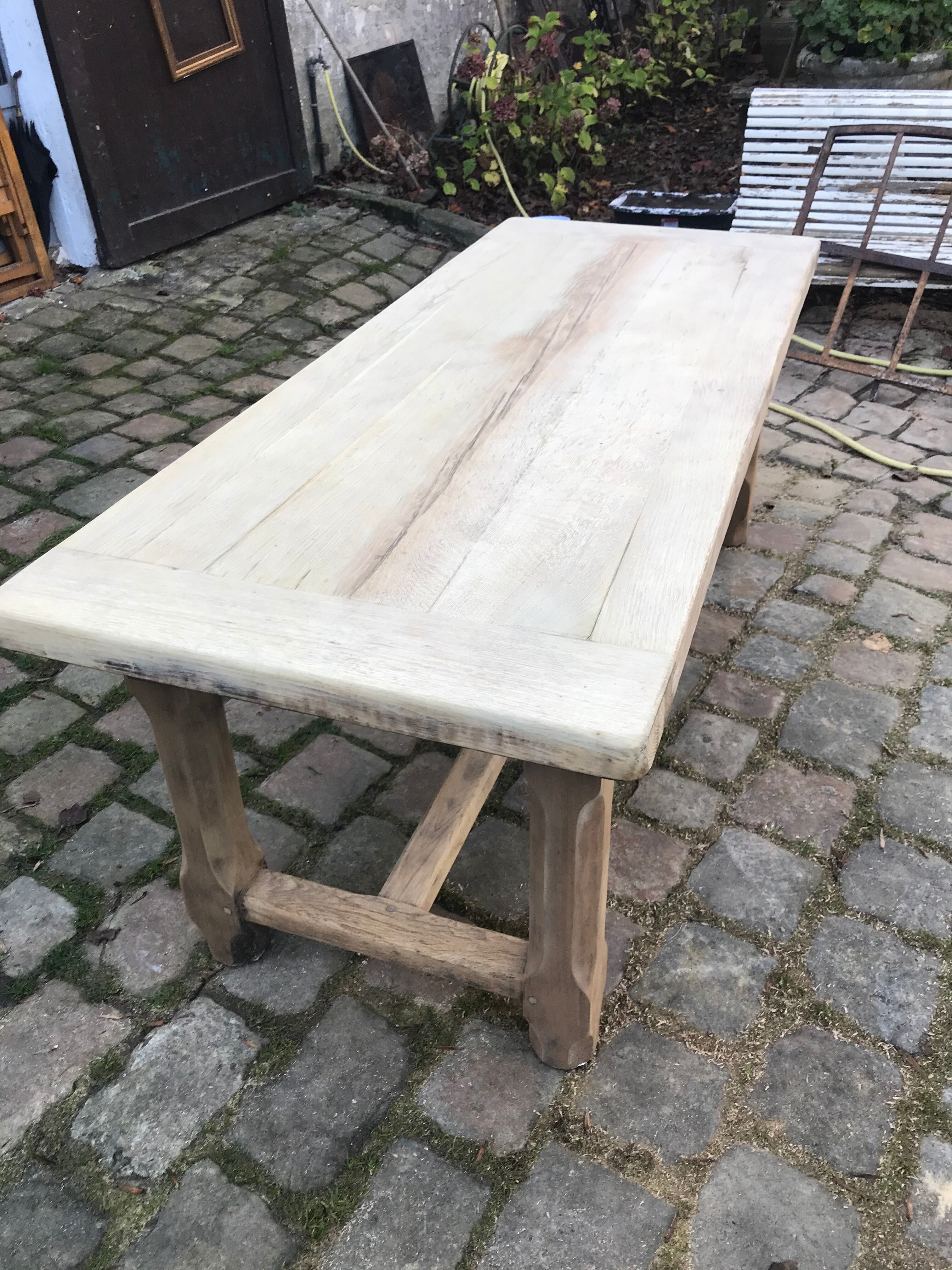 Lightened rustic stripped oak table