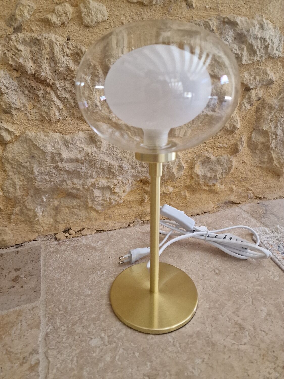 Glass and brass lamp