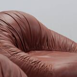 Pangolin leather sofa and armchair by Egg Designs