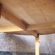 round coffee table in solid wood brutalist design bohemian decor